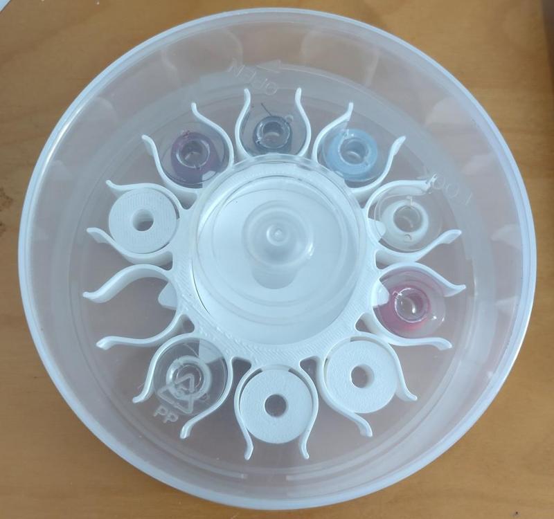 Bobbin sun holder for CD / DVD spool case