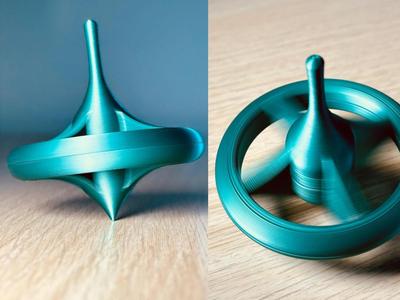 Floating Ring Spinning Top