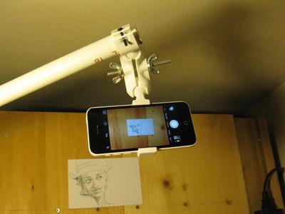 Ball joint phone mount with tripod mount