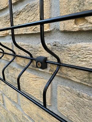 Mesh panel wall bracket mount