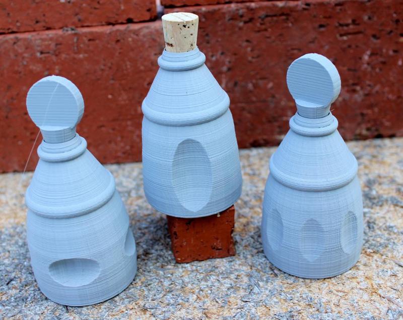 Three Small Decorated Bottles