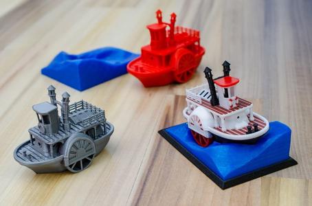Old paddle-wheel steam boat with display stand (visual benchy)