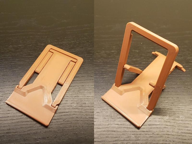 Phone travel stand with flex lock