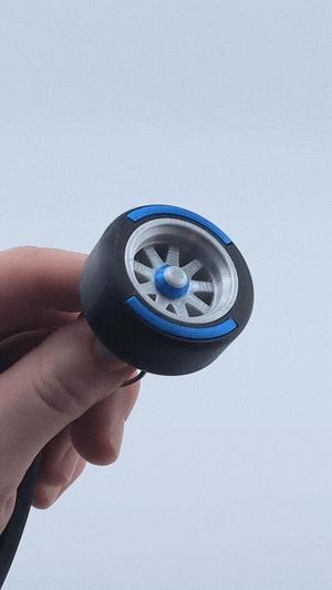 Spinning F1 Inspired Tire Keychain