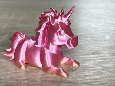 Cute lying unicorn