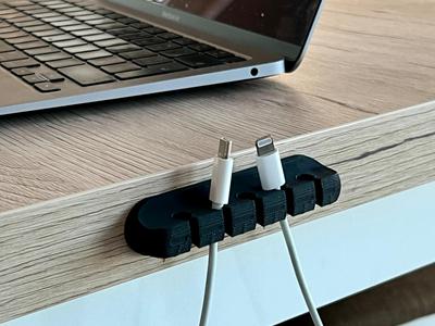 Desk cable holder