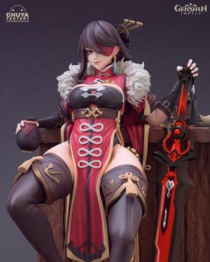 Beidou action figure on wooden table