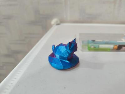 Lowpoly Cute Cat sitting on a rock