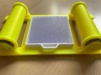 5.8L Rice Bucket Desiccant Box Ver 2.  Desiccant pours out easily without spilling.  Mesh body is adjustable and can be hung.