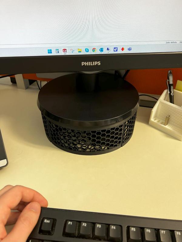 Desktop monitor lifter with hidden chest