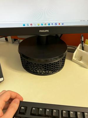 Desktop monitor lifter with hidden chest