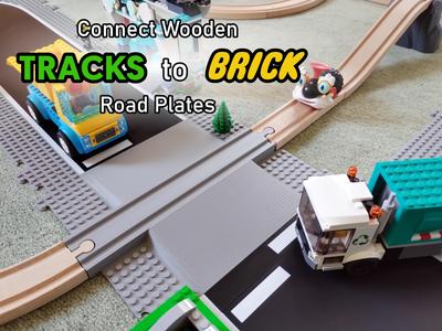 Connect wooden train tracks to Brick road plates