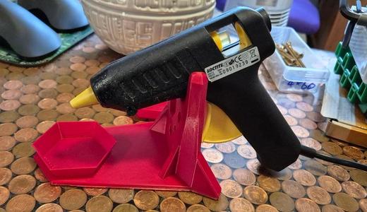 Glue gun stand with replaceable drip bowl