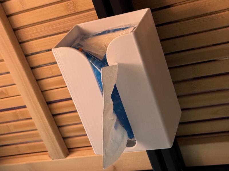 Wall mounted tissue box