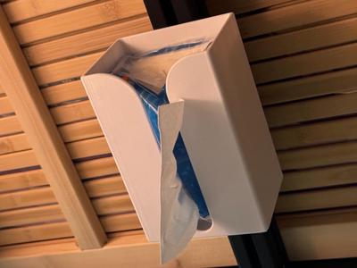 Wall mounted tissue box