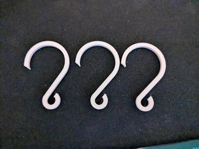 Trinket hanger for a round pipe   