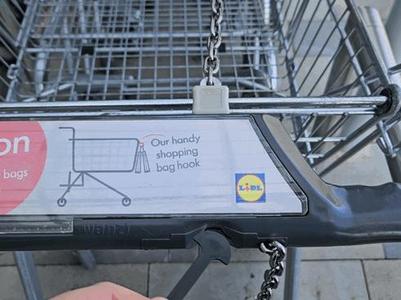 Shopping trolley unlocking key and token