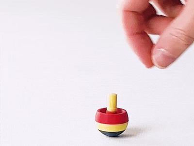 Reversing spinning top magically turns to the other side