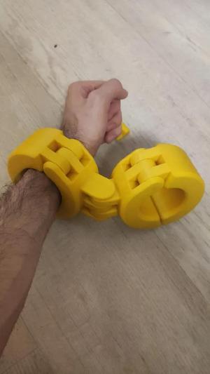 Hinged handcuffs, print in place.   