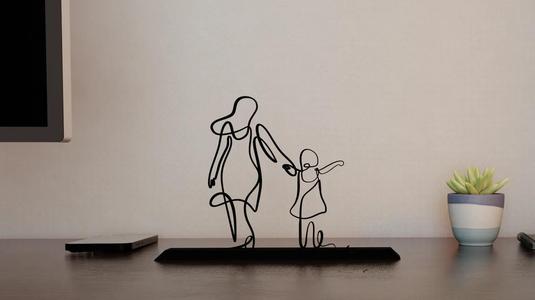 Mother and girl holding hands