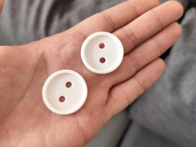 Practical clothing button measuring 30x30mm