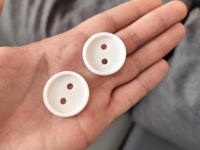 Practical clothing button measuring 30x30mm