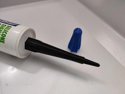 Silicone nozzle with cap
