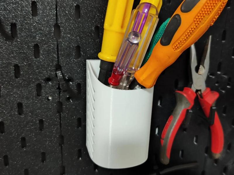 Whose pegboard? DLC4 (including 2 pen holders and 4 Infinite Expansion No. 1 hooks) is compatible with some IKEA pegboards