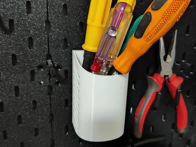 Whose pegboard? DLC4 (including 2 pen holders and 4 Infinite Expansion No. 1 hooks) is compatible with some IKEA pegboards