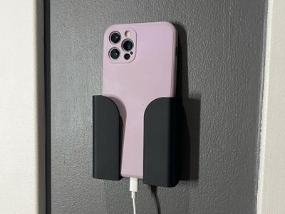 Wall mounted phone holder