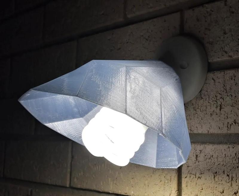 Twisting Lofted Cover for Angled Wall Light