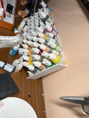Water-based paint and paint rack