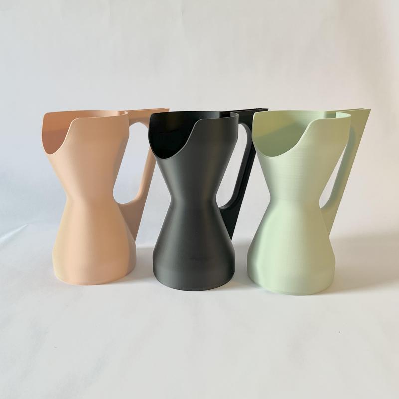 Hourglass shaped watering can