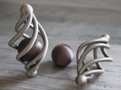 Impossible Trapped Ball Fidget in Spiral Cage