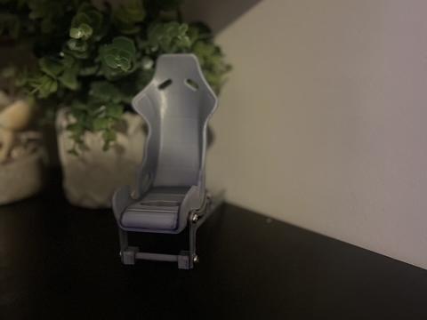 Racing car seat phone holder