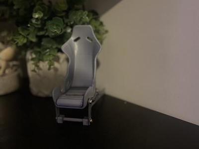 Racing car seat phone holder