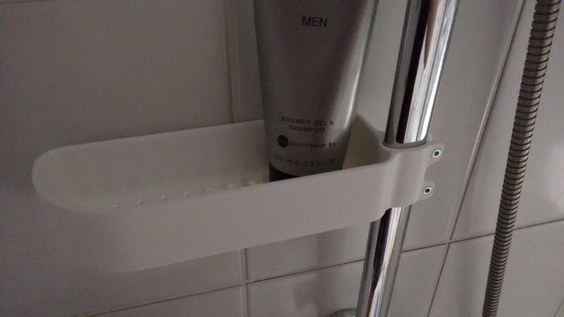 Screw on shower basket / shower caddy for oval shower rails