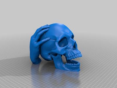 Hand And Skull Head