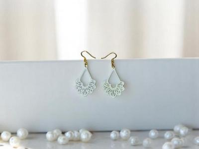 White ornament earrings