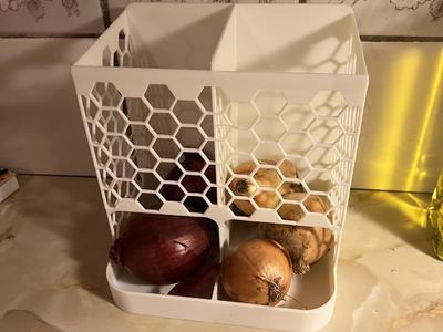 Onion storage dispenser