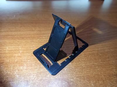 Credit Card Sized Folding Phone Stand - remix