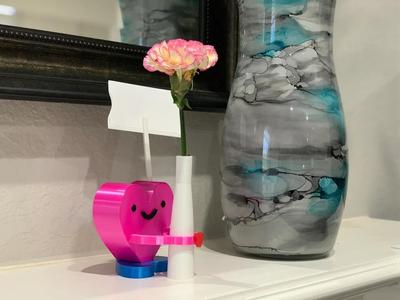 Cute heart holding single flower vase