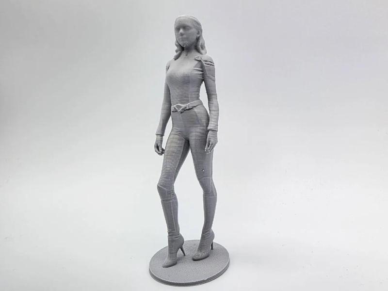 Female in Uniform Figurine