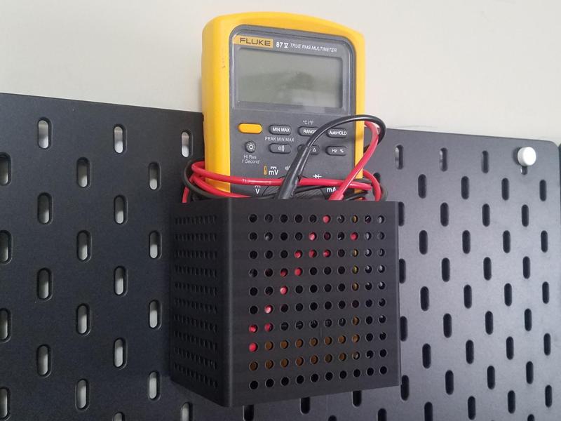 Skadis Large Container holds Fluke 87V Multimeter