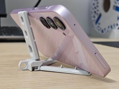 Foldable phone stand (automatic arms)