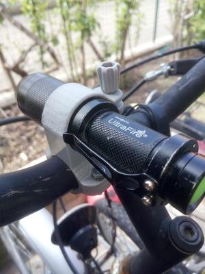 Flashlight bike holder