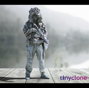 Soldier in ghillie helmet