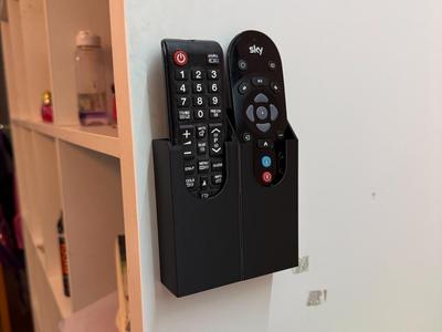 Wall-mounted Sky and Samsung remote control holder 