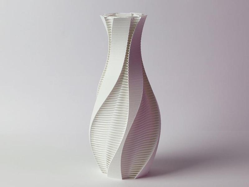 Twisted vase with strands