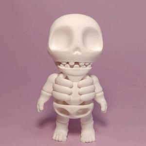 TINY BITING SKULL, PRINT-IN-PLACE, MOUTH ARTICULATED, CUTE-FLEXI